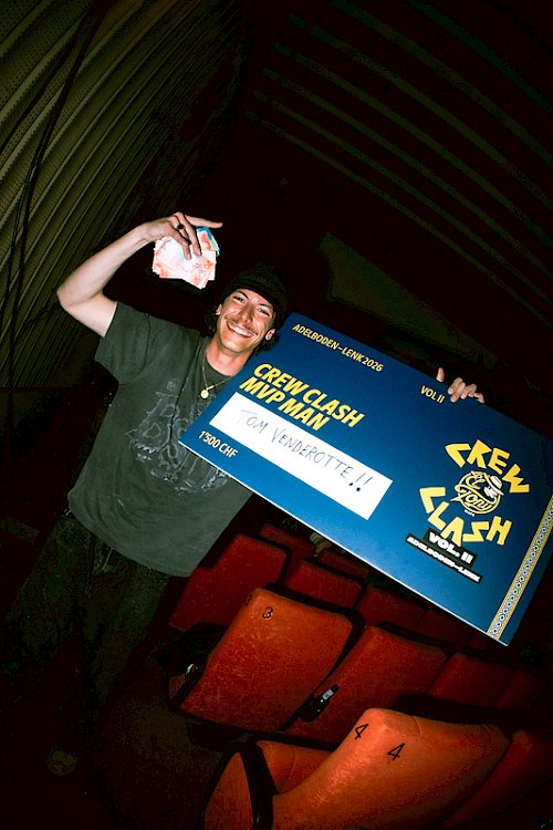 Young man in a cinema with a Crew Clash poster and El Tony Mate beverage.